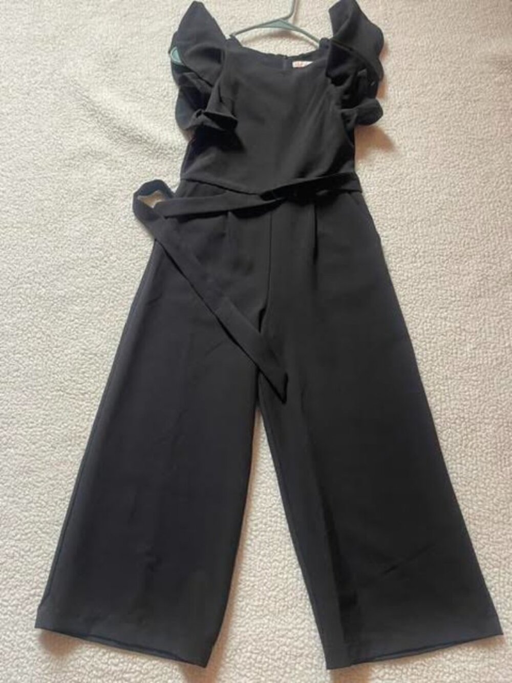 Black one-piece pants suit